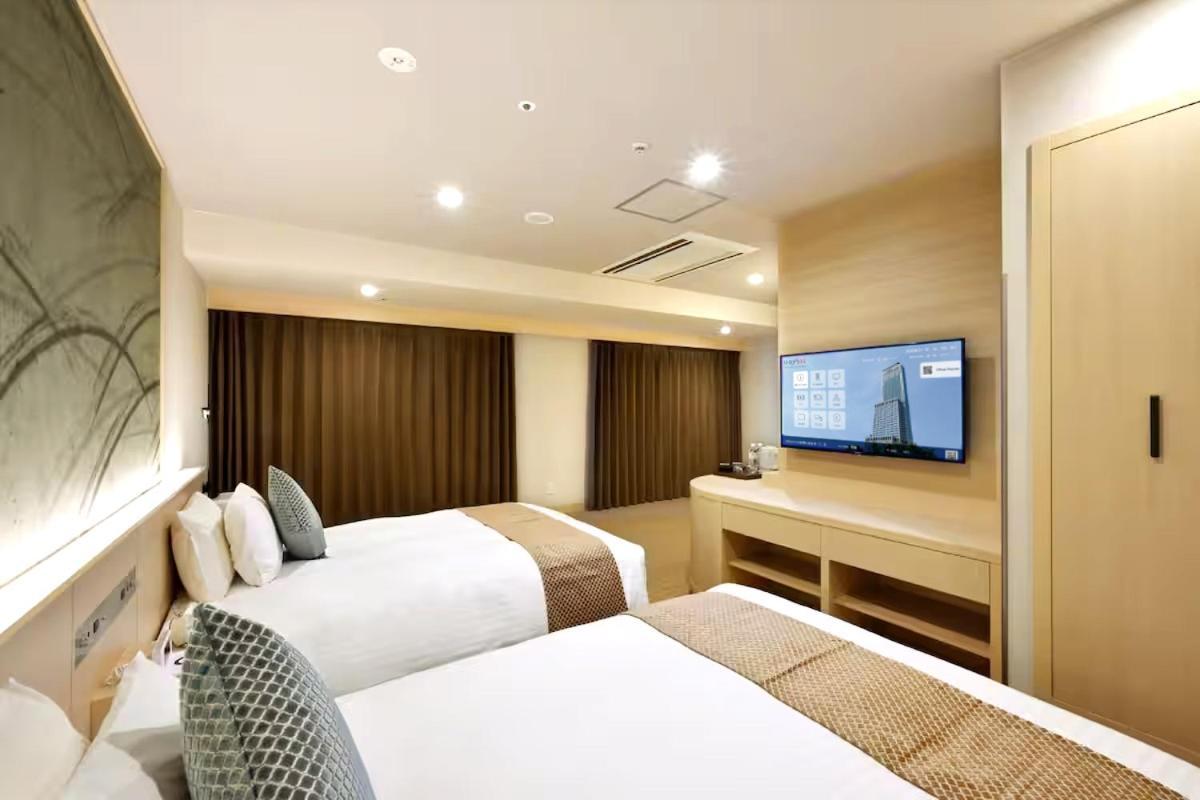 Odysis Suites Osaka Airport Hotel Izumisano Exterior photo